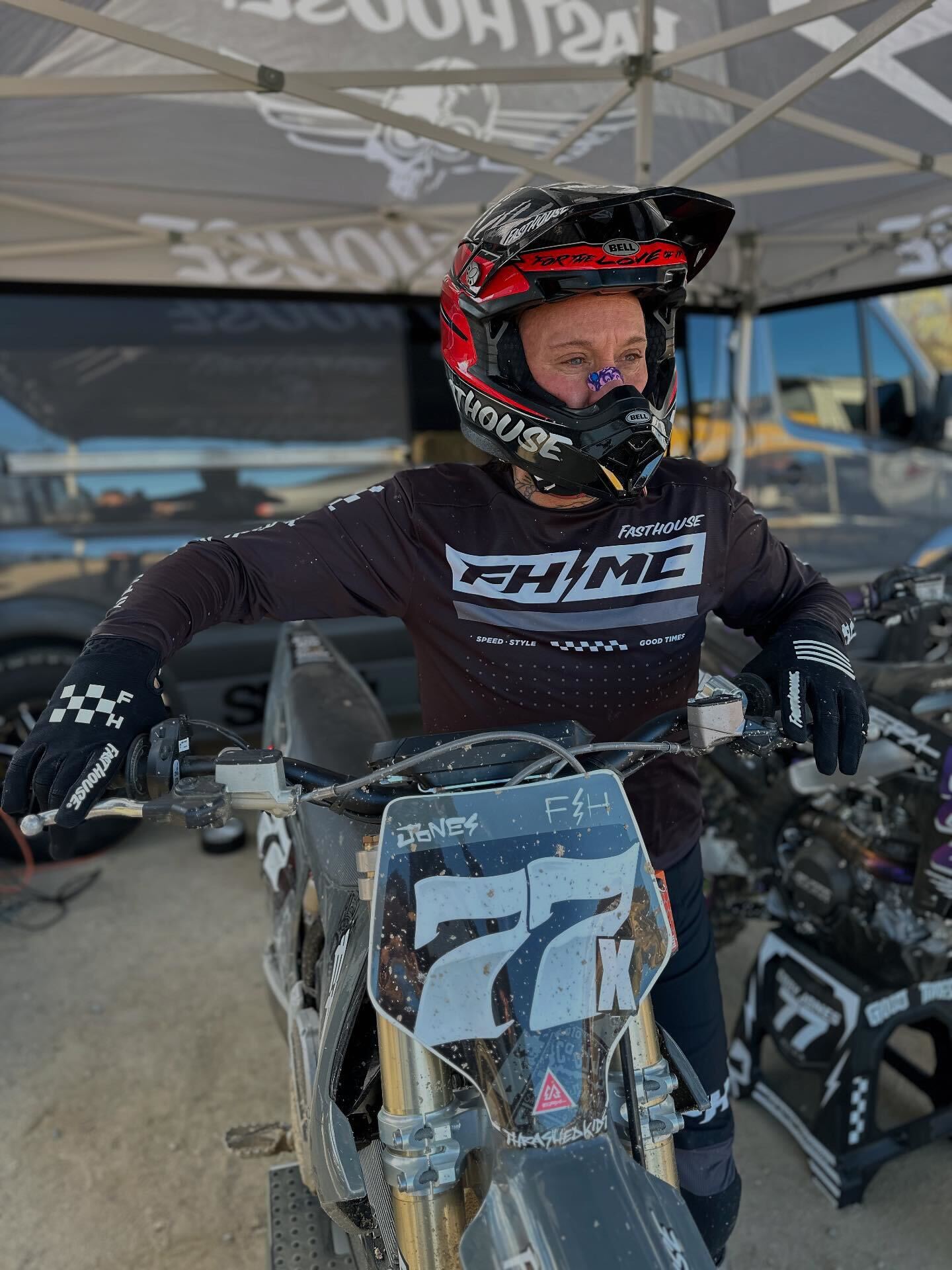 Dirt biker wearing SLYD nasal strip for better breathing during race.